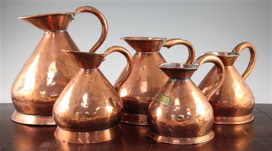 Five Victorian graduated copper haystack measures, largest 11in.